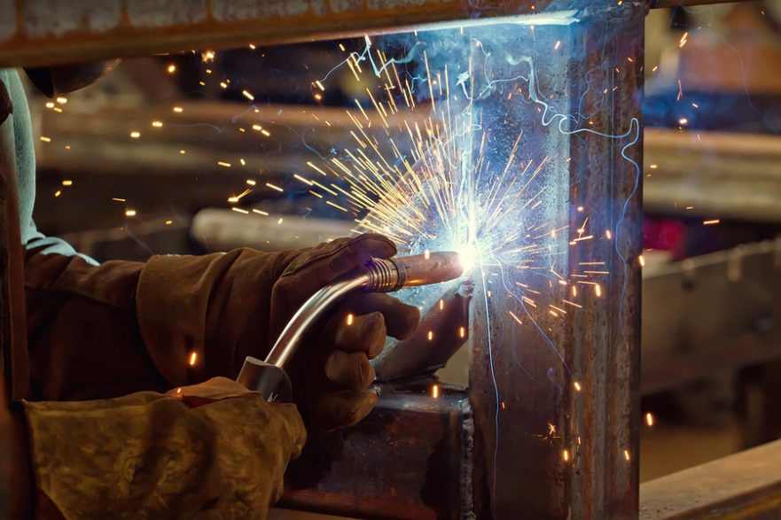 Steel rebar worker welding steel structure